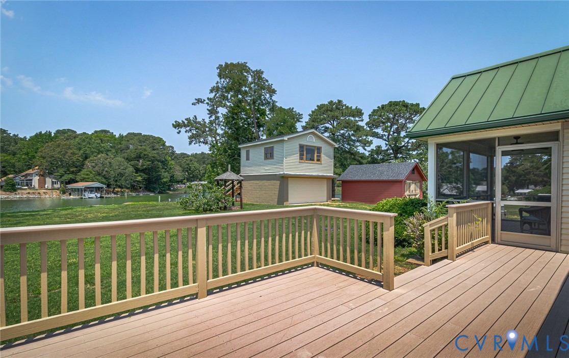 618 Main Street Reedville, VA 22539 - Photo 24 of 54 Expansive deck featuring natural wood-finish raili