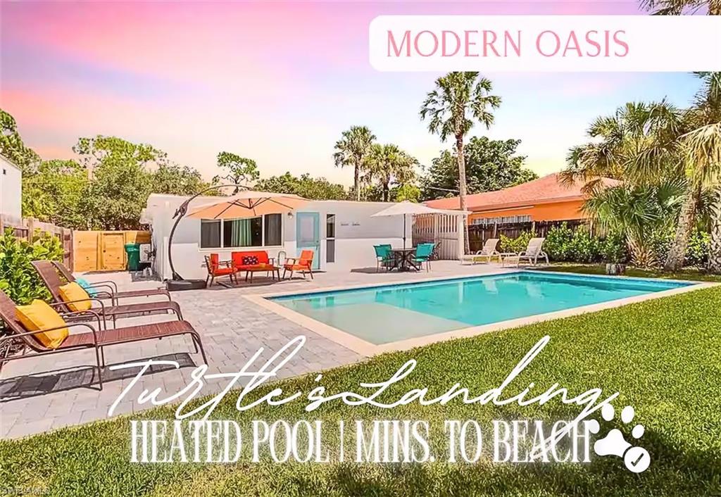 3024 Estey Avenue Naples, FL 34104 - Photo 1 of 19 a view of swimming pool with outdoor seating