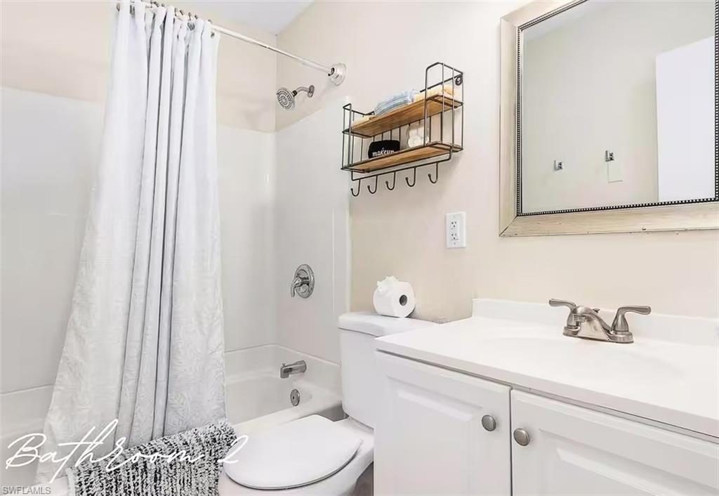 3024 Estey Avenue Naples, FL 34104 - Photo 13 of 19 a bathroom with a sink toilet and shower