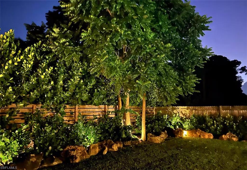 3024 Estey Avenue Naples, FL 34104 - Photo 19 of 19 a view of yard with tree in back