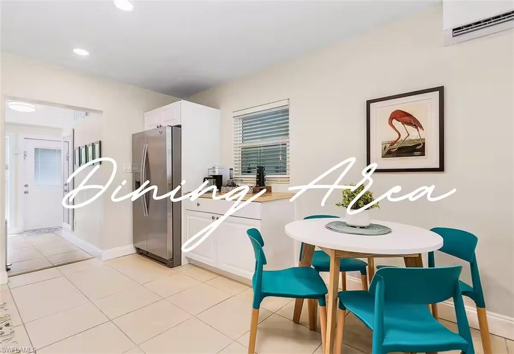 3024 Estey Avenue Naples, FL 34104 - Photo 8 of 19 a view of a dining room with furniture