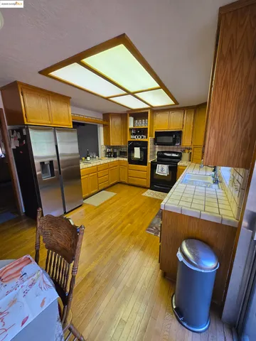 a living room with a fireplace furniture and a window