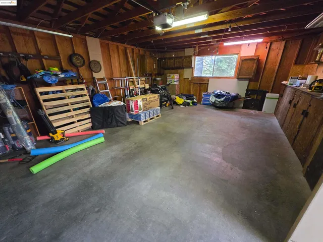 a view of a room that has a large window