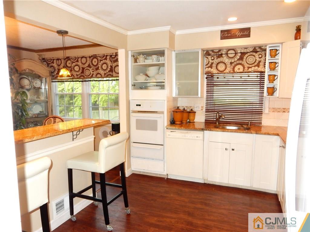 18 Villanova Road Old Bridge, NJ 08859 - Photo 5 of 25 a view of a dining area with furniture window and wooden floor