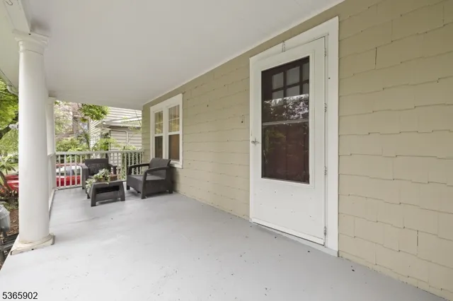 a view of livingroom with furniture and garden