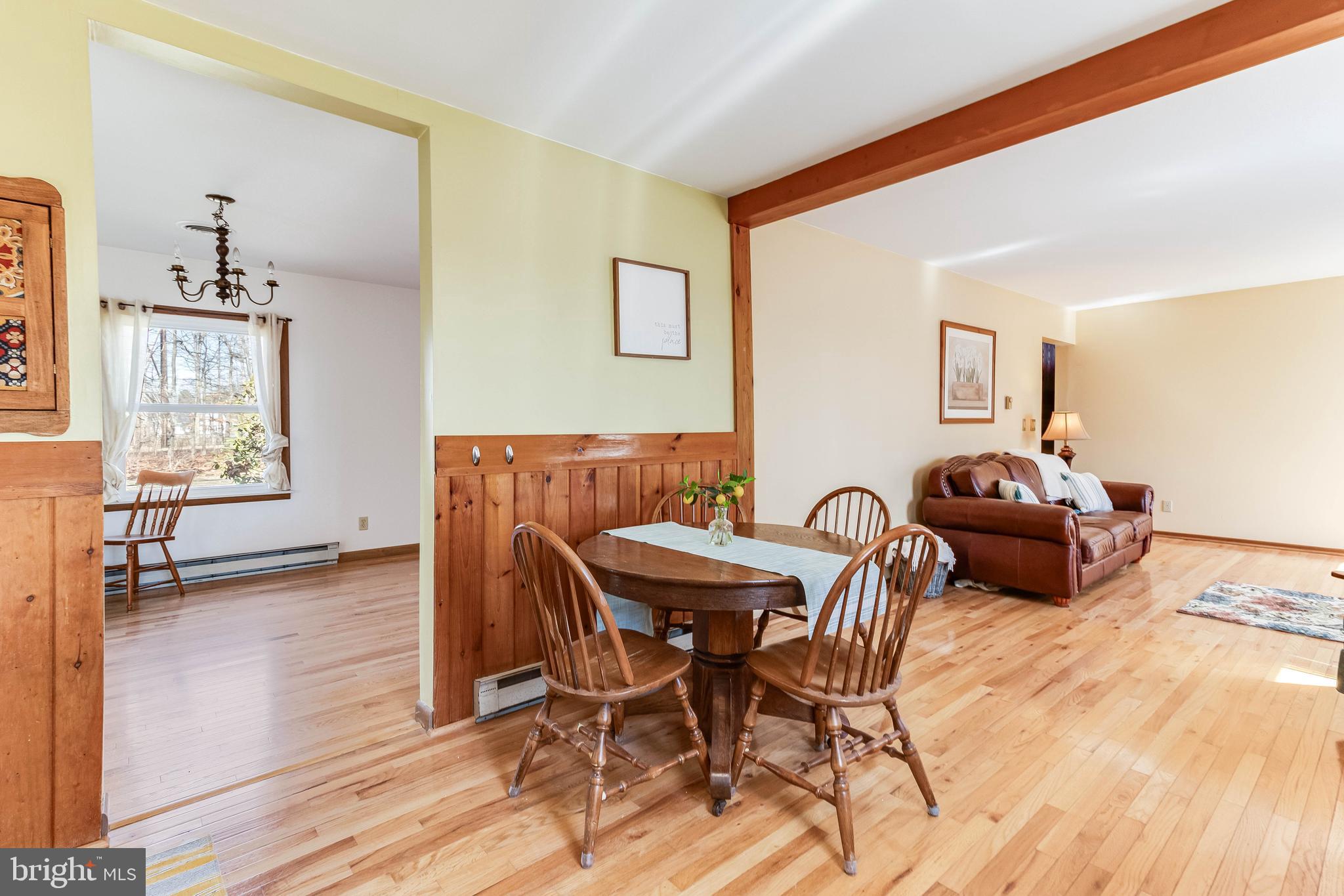 1966 Vandyke Greenspring Road Smyrna, DE 19977 - Photo 12 of 45 a view of a dining room with furniture and wooden floor