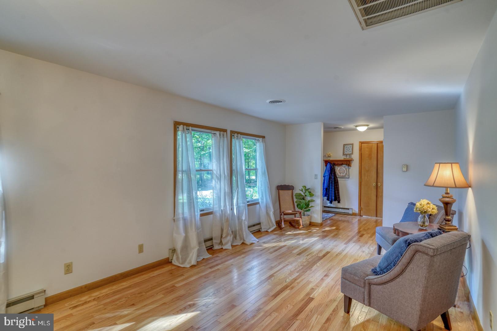 1966 Vandyke Greenspring Road Smyrna, DE 19977 - Photo 13 of 45 a living room with furniture and a window