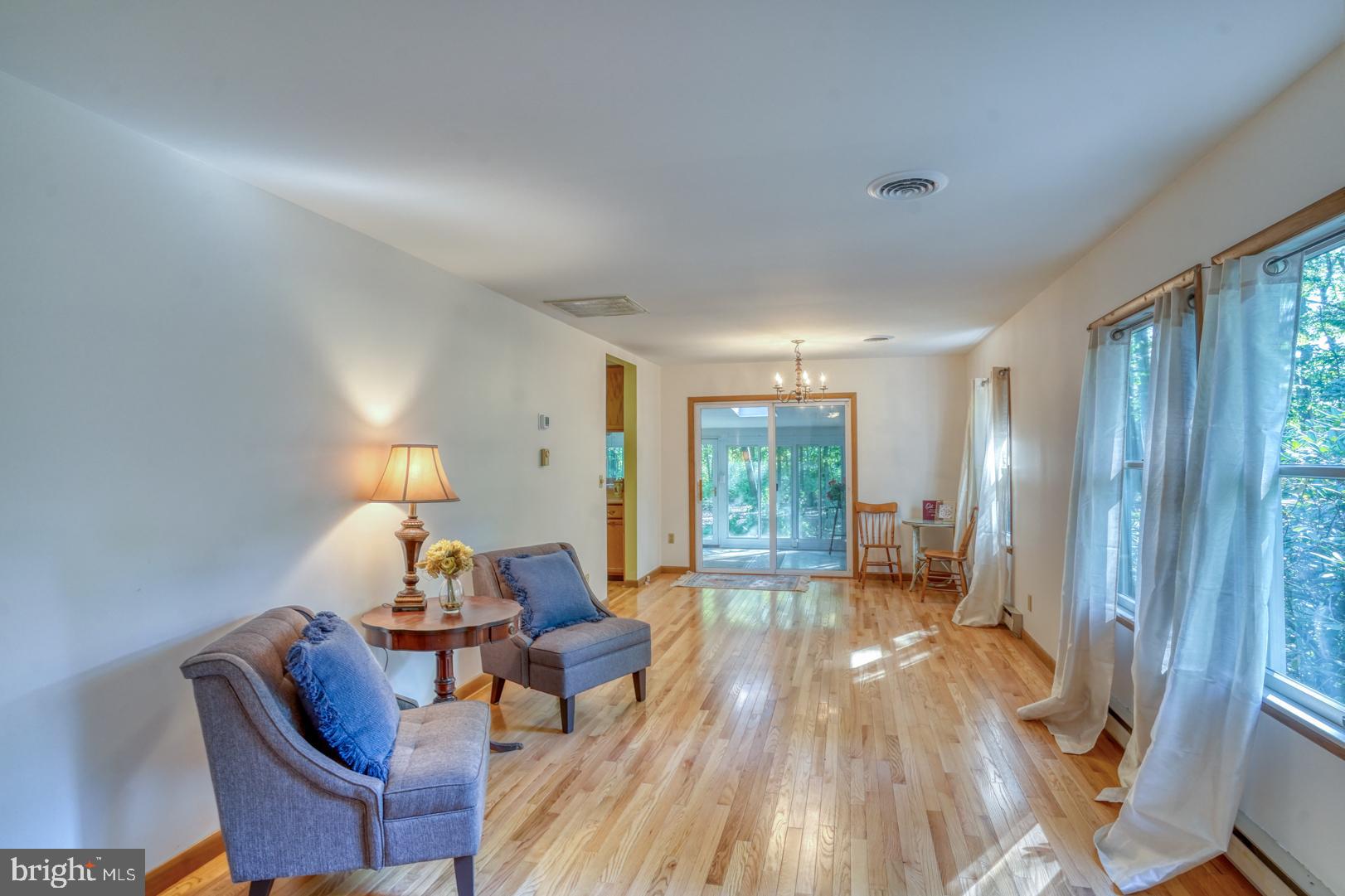 1966 Vandyke Greenspring Road Smyrna, DE 19977 - Photo 15 of 45 a living room with furniture and a wooden floor