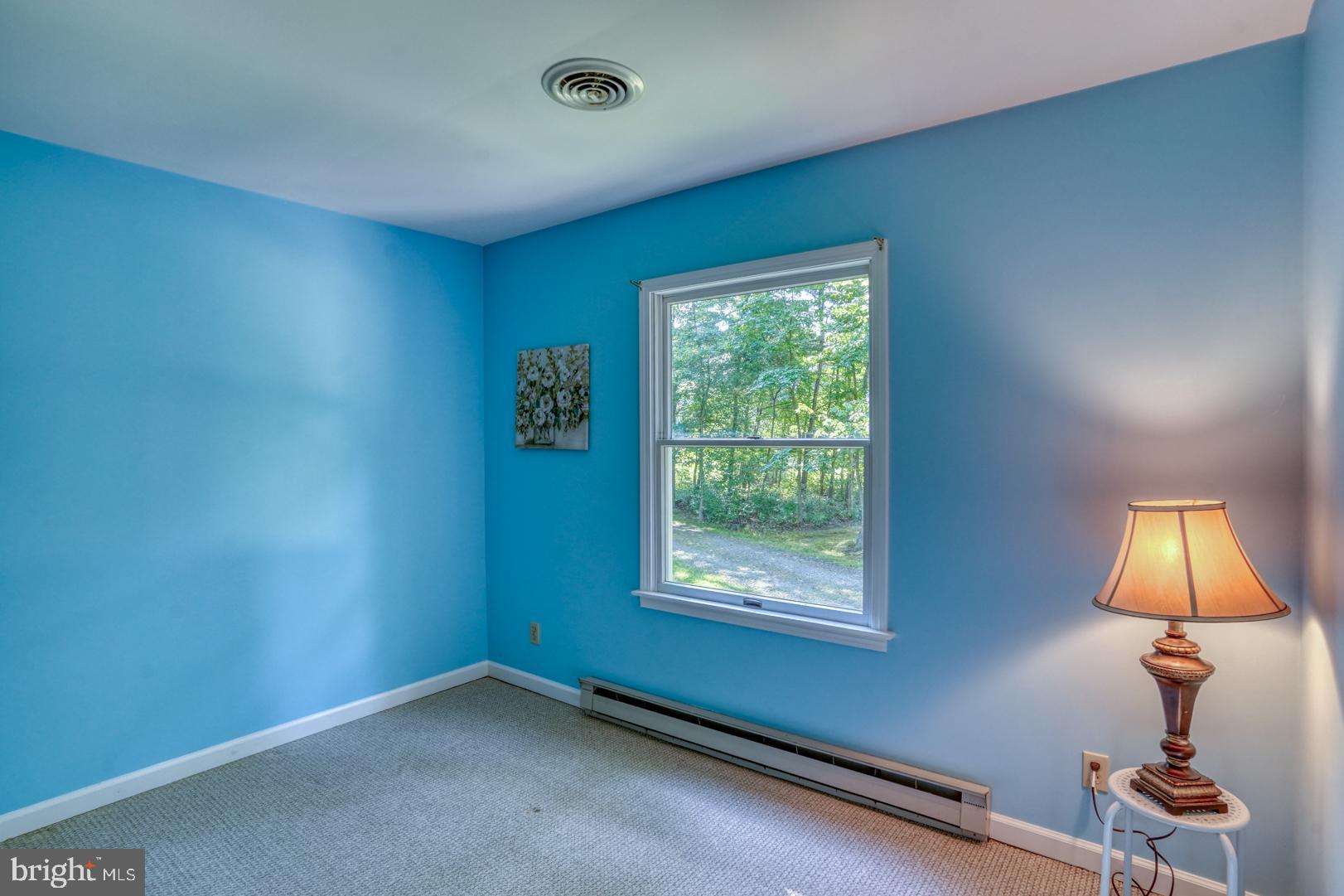1966 Vandyke Greenspring Road Smyrna, DE 19977 - Photo 23 of 45 an empty room with a window