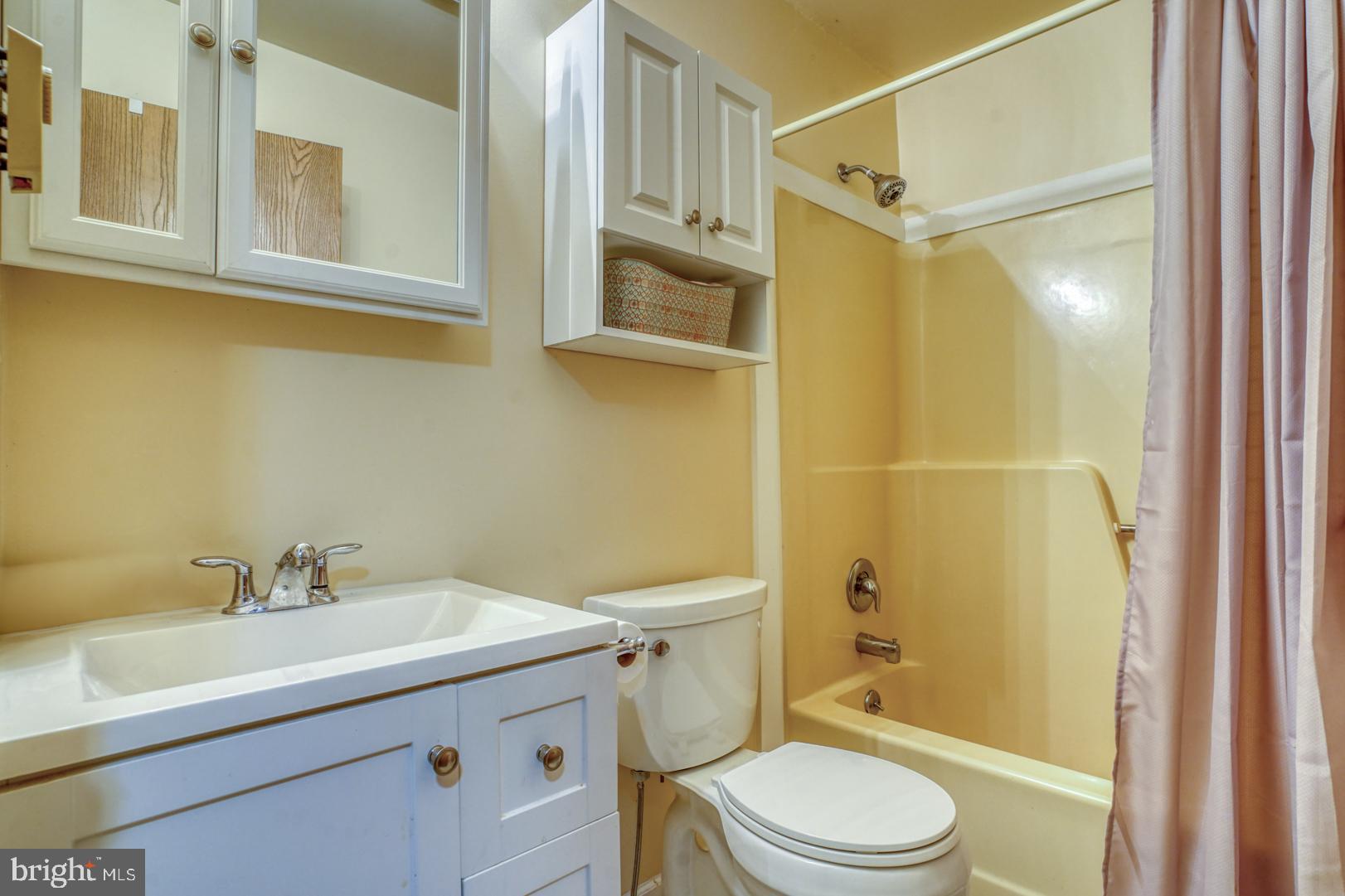 1966 Vandyke Greenspring Road Smyrna, DE 19977 - Photo 26 of 45 a bathroom with a sink toilet and shower