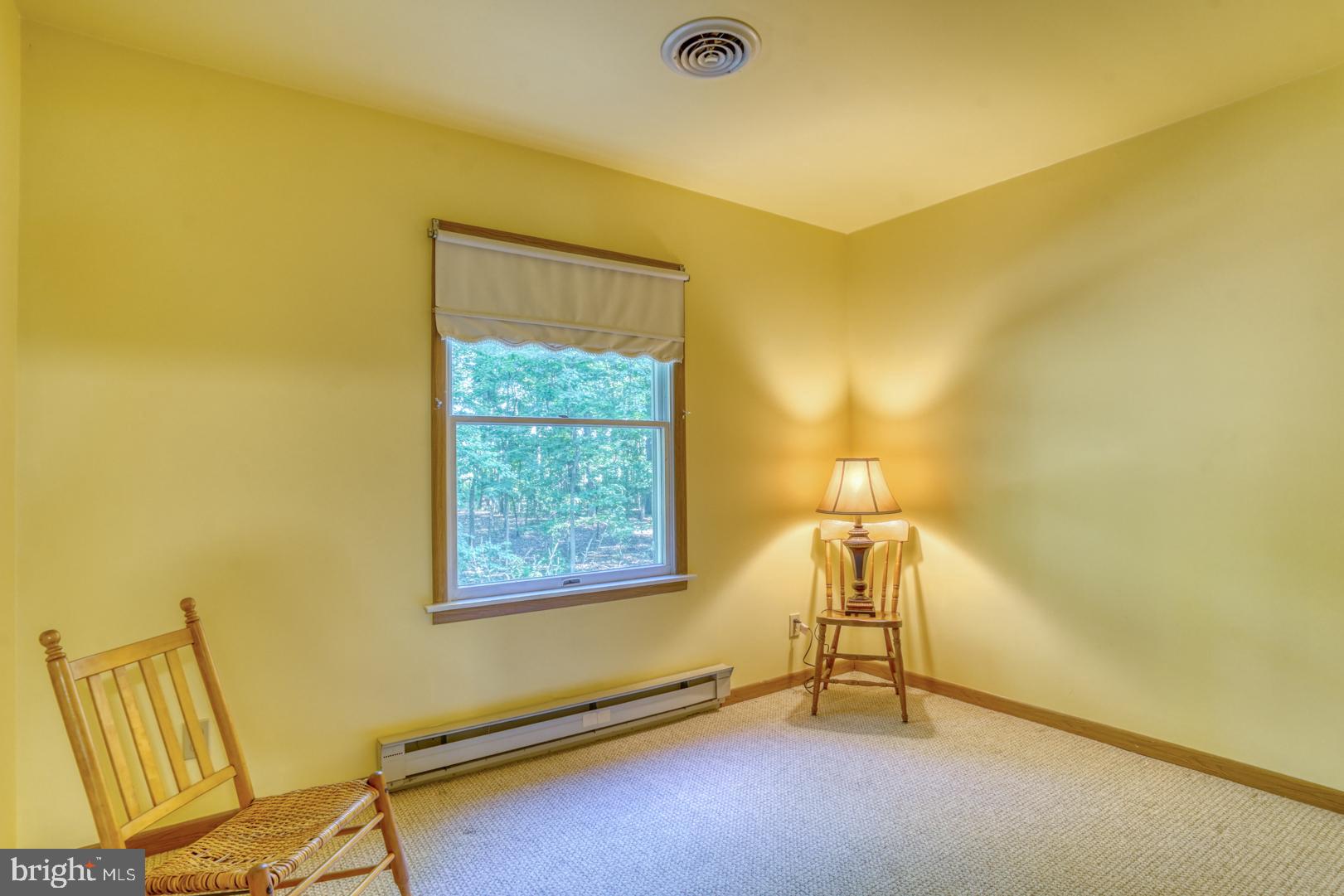 1966 Vandyke Greenspring Road Smyrna, DE 19977 - Photo 27 of 45 a room with a window and a table