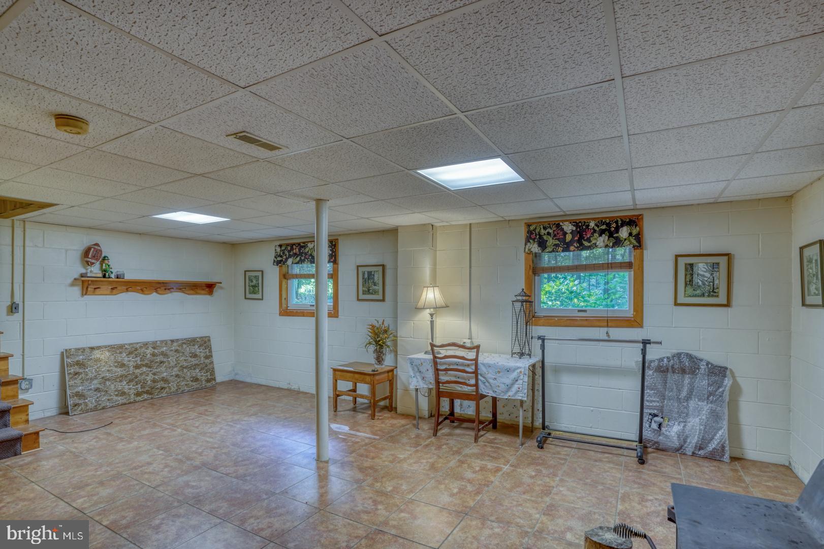 1966 Vandyke Greenspring Road Smyrna, DE 19977 - Photo 30 of 45 a view of a livingroom with furniture and a flat screen tv