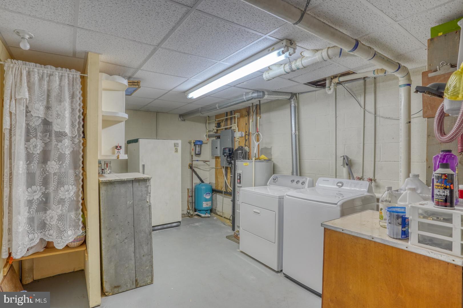 1966 Vandyke Greenspring Road Smyrna, DE 19977 - Photo 34 of 45 a room filled with furniture and a chandelier