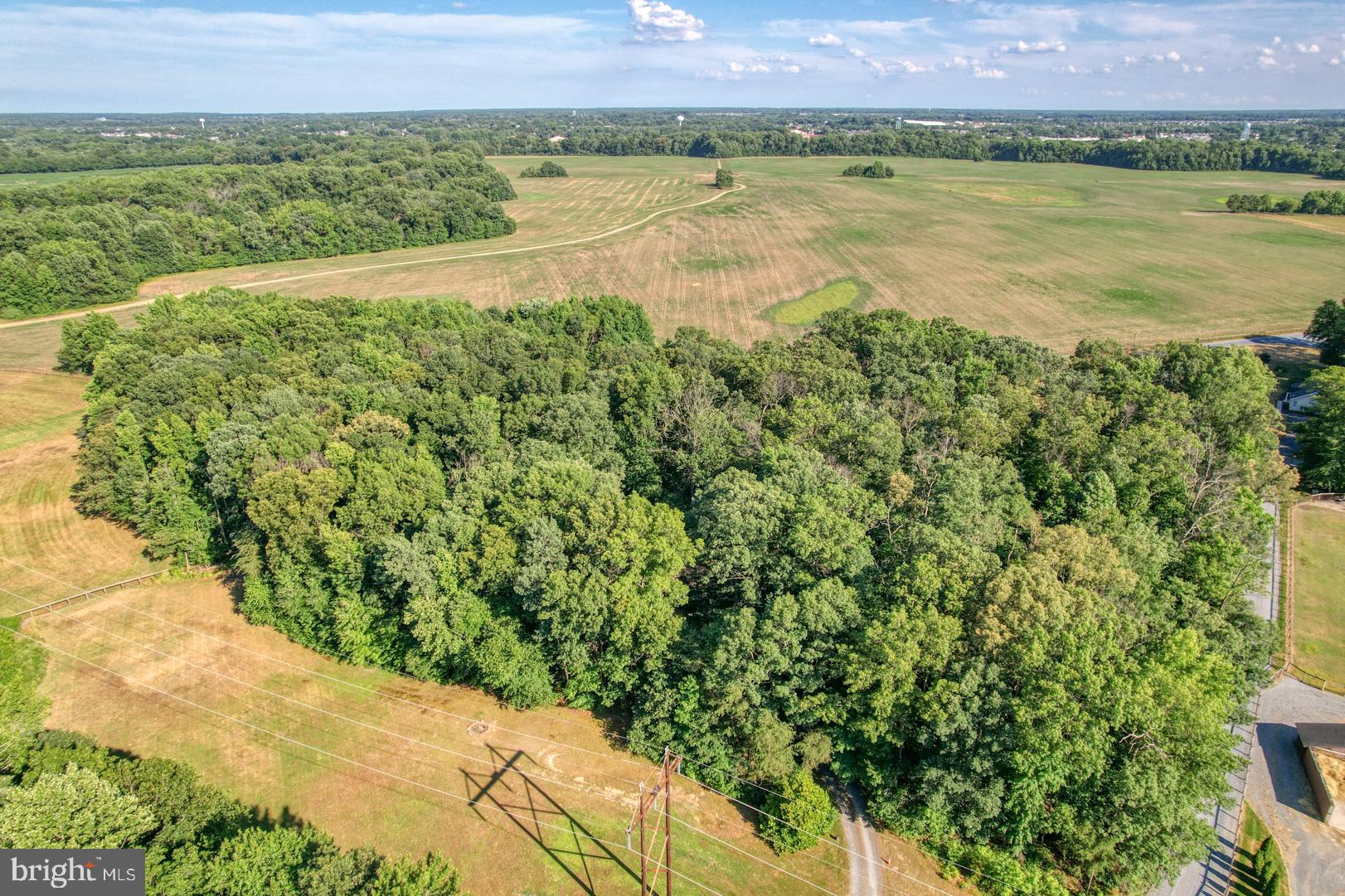 1966 Vandyke Greenspring Road Smyrna, DE 19977 - Photo 4 of 45 a view of a lake with a city