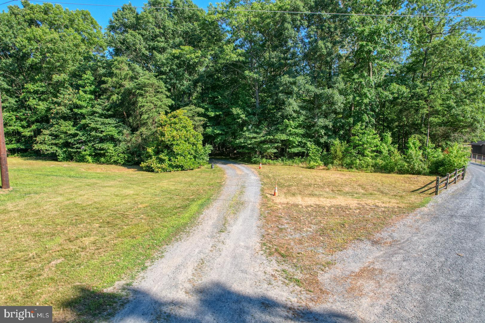 1966 Vandyke Greenspring Road Smyrna, DE 19977 - Photo 5 of 45 a view of a pathway with a yard