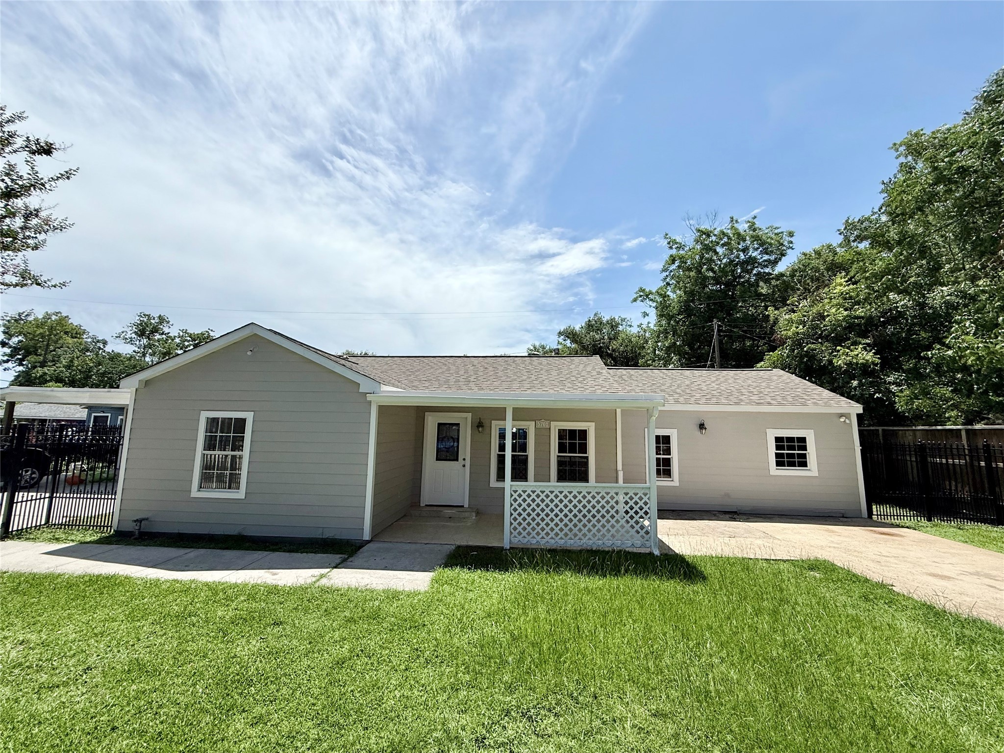 5701 Luna Street Houston, TX 77076 - Photo 13 of 50 a house view with a garden space