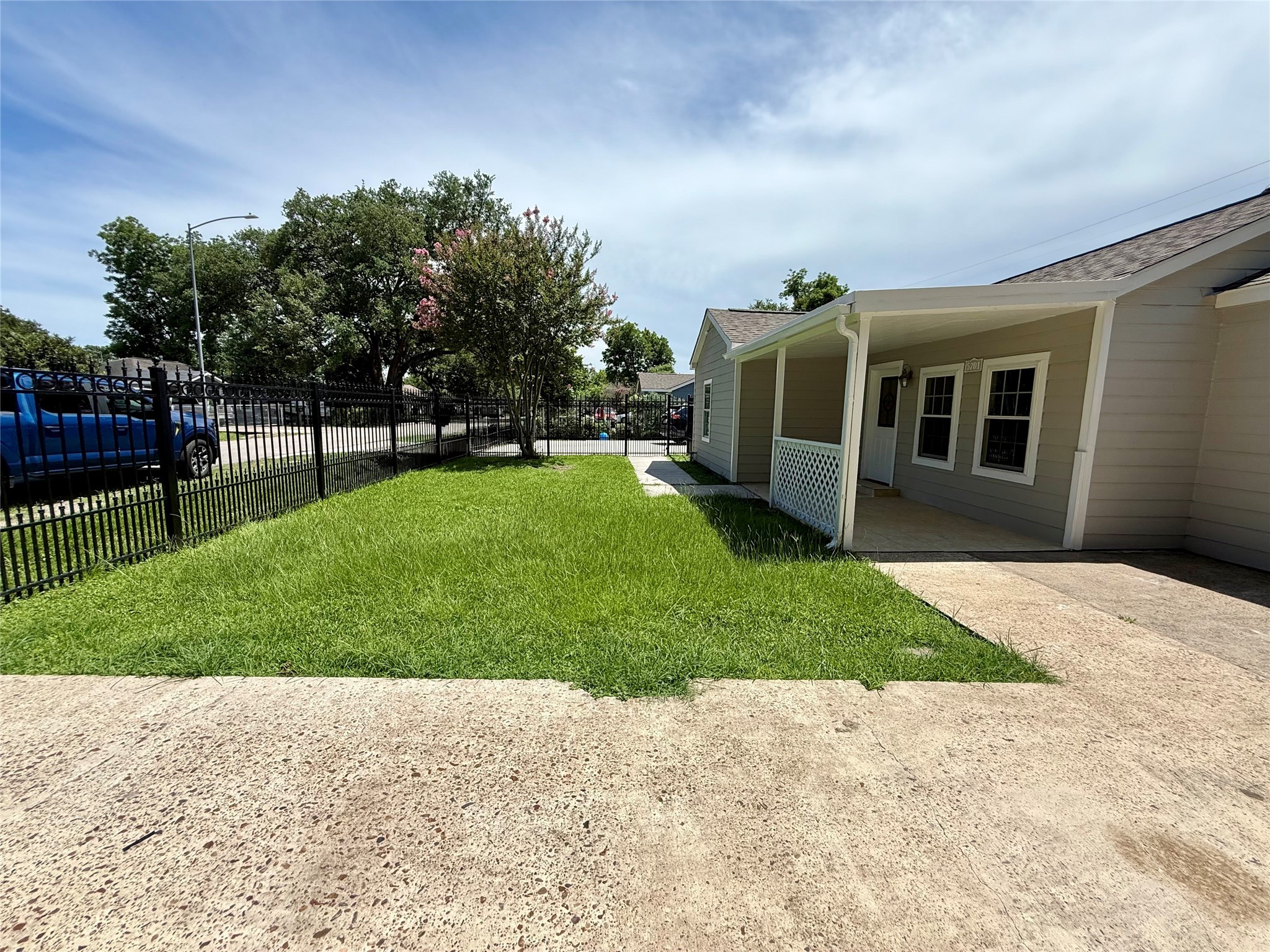 5701 Luna Street Houston, TX 77076 - Photo 16 of 50 a view of a house with backyard and porch