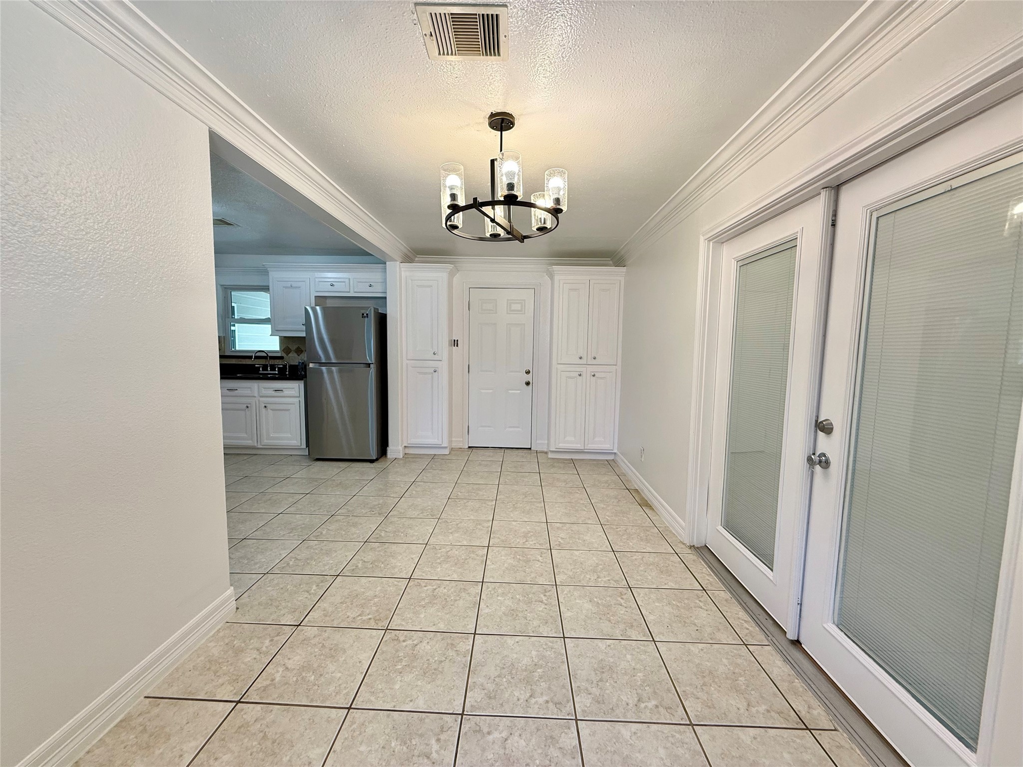 5701 Luna Street Houston, TX 77076 - Photo 26 of 50 a view of empty room with wooden floor