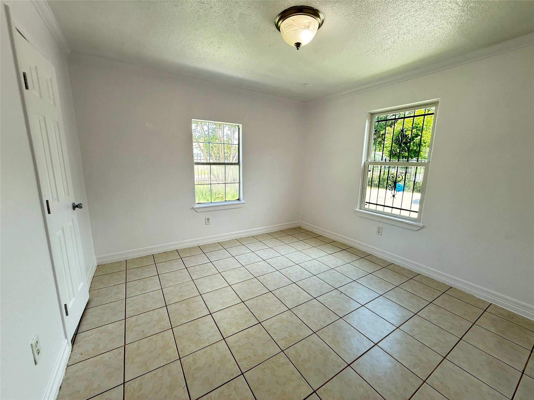 5701 Luna Street Houston, TX 77076 - Photo 37 of 50 a view of an empty room and window