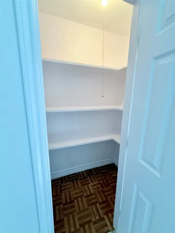 an aerial view of multiple houses with yard