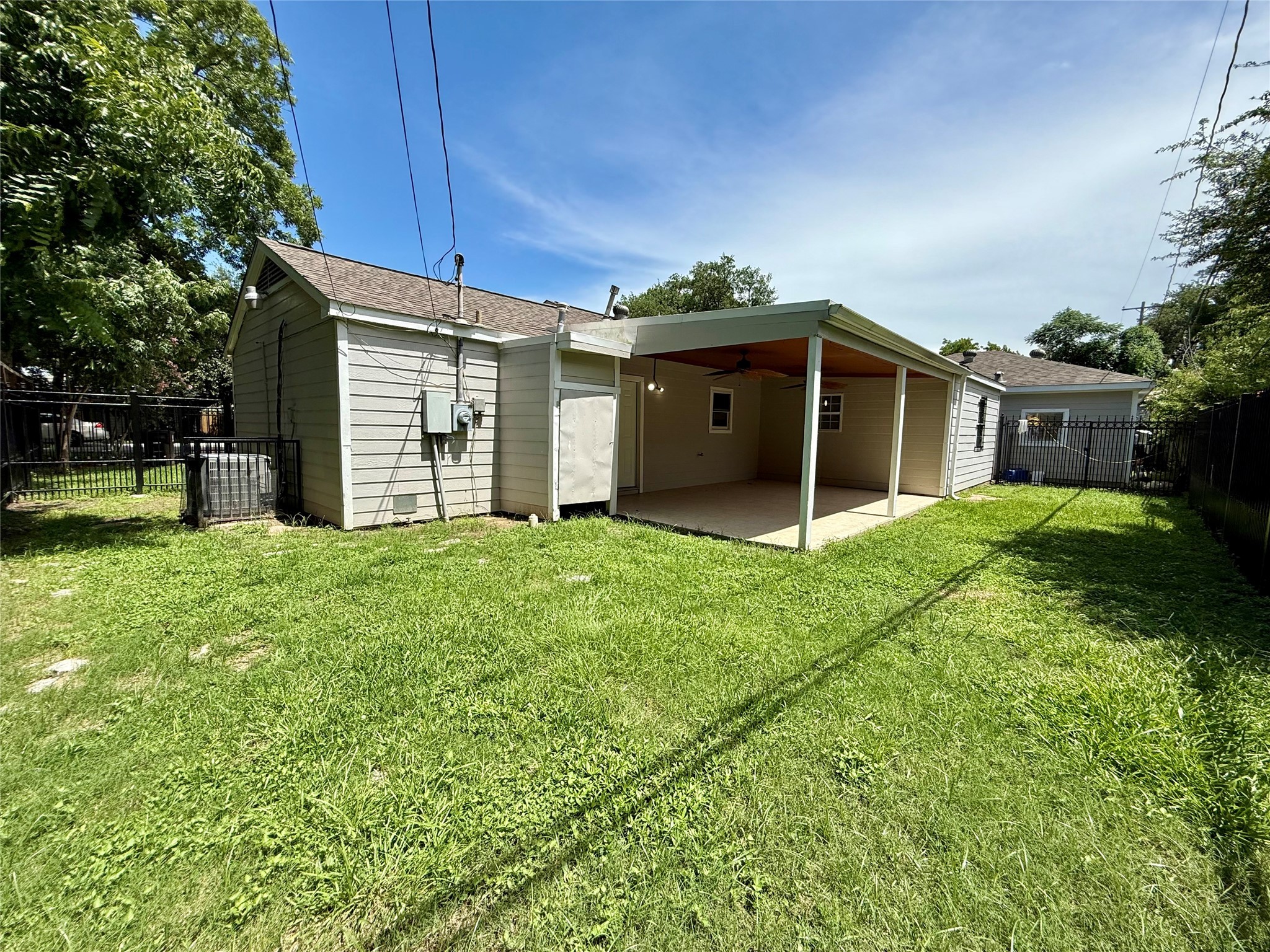5701 Luna Street Houston, TX 77076 - Photo 43 of 50 a view of a house with a yard