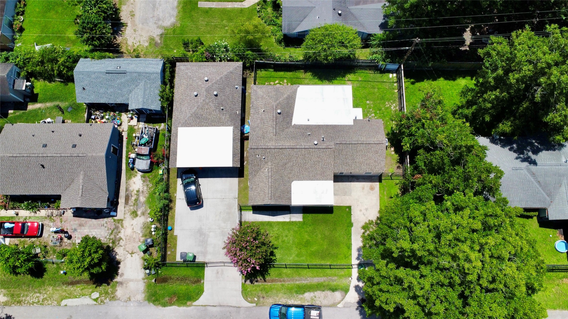 5701 Luna Street Houston, TX 77076 - Photo 45 of 50 an aerial view of multiple houses with yard