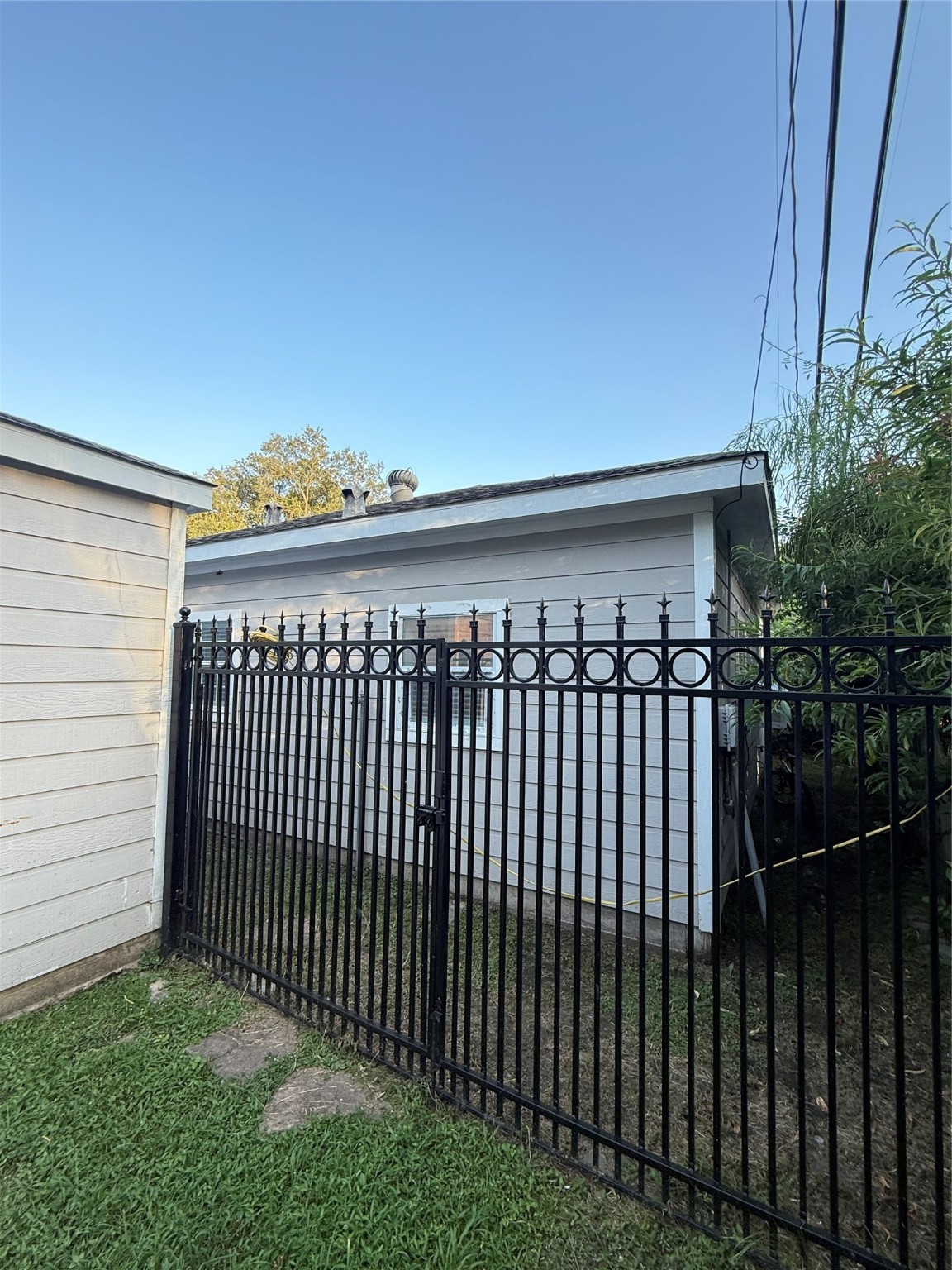 5701 Luna Street Houston, TX 77076 - Photo 48 of 50 a view of a black gate