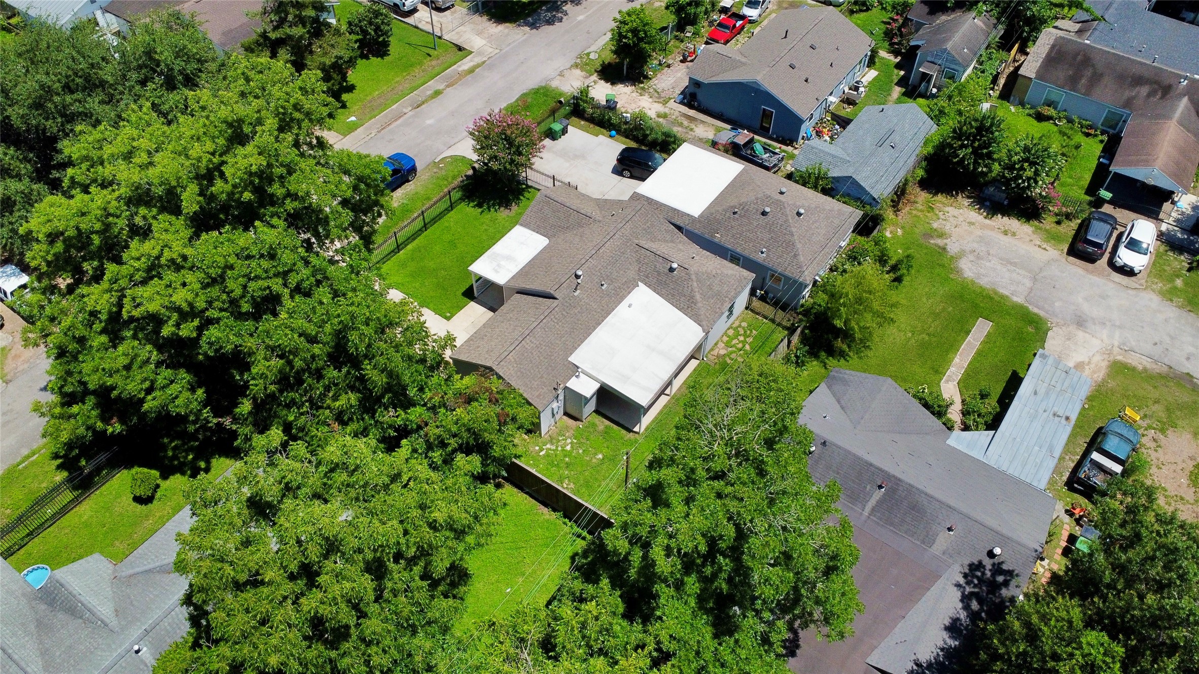 5701 Luna Street Houston, TX 77076 - Photo 5 of 50 an aerial view of a house with a yard