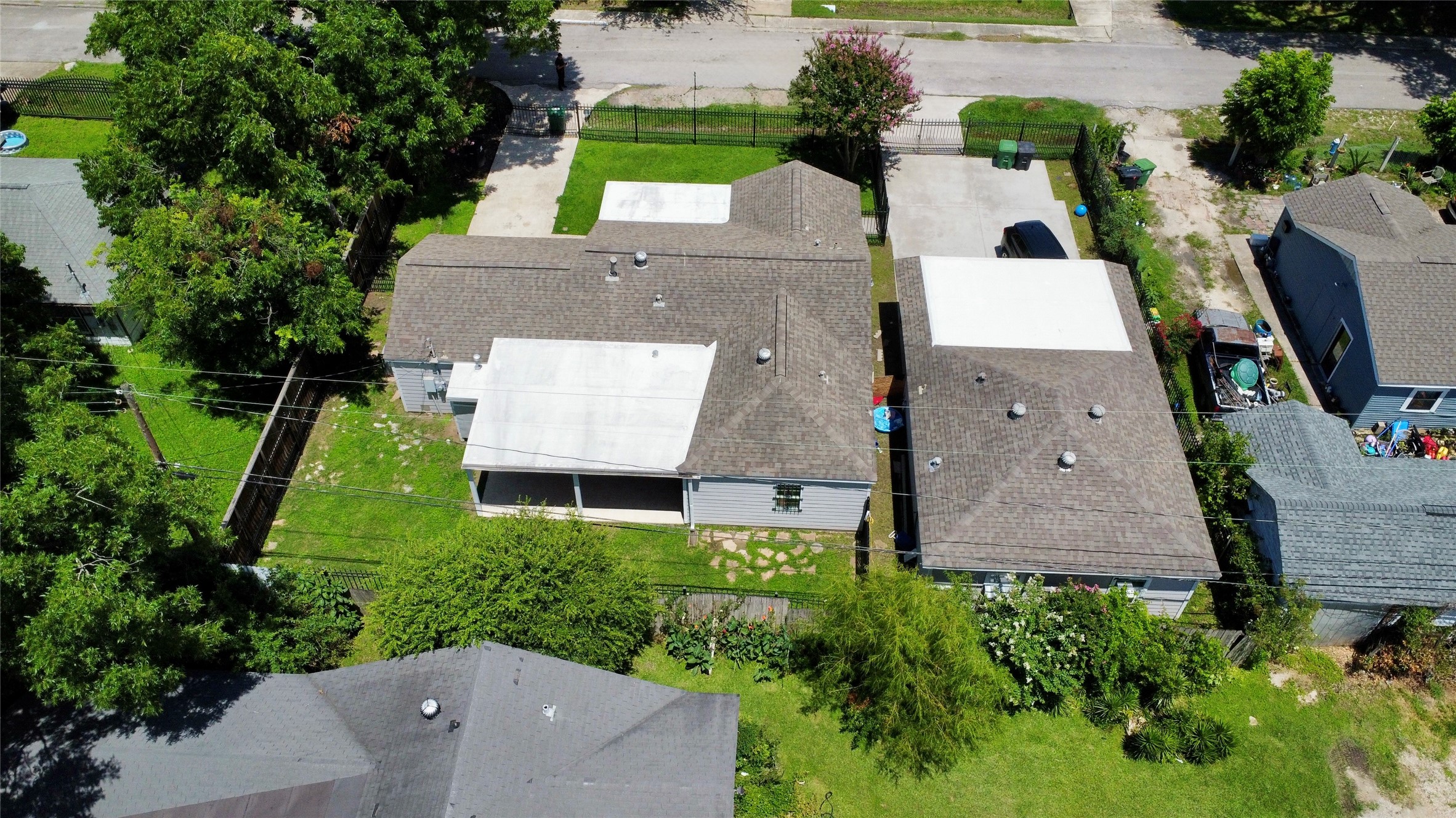 5701 Luna Street Houston, TX 77076 - Photo 6 of 50 an aerial view of house with yard swimming pool and outdoor seating