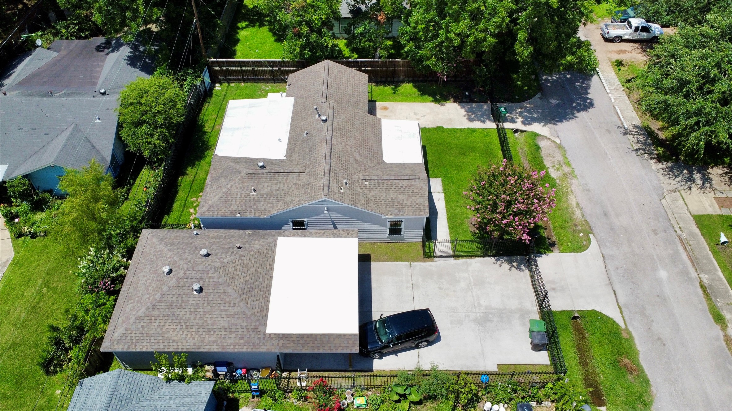 5701 Luna Street Houston, TX 77076 - Photo 7 of 50 an aerial view of a house with a swimming pool