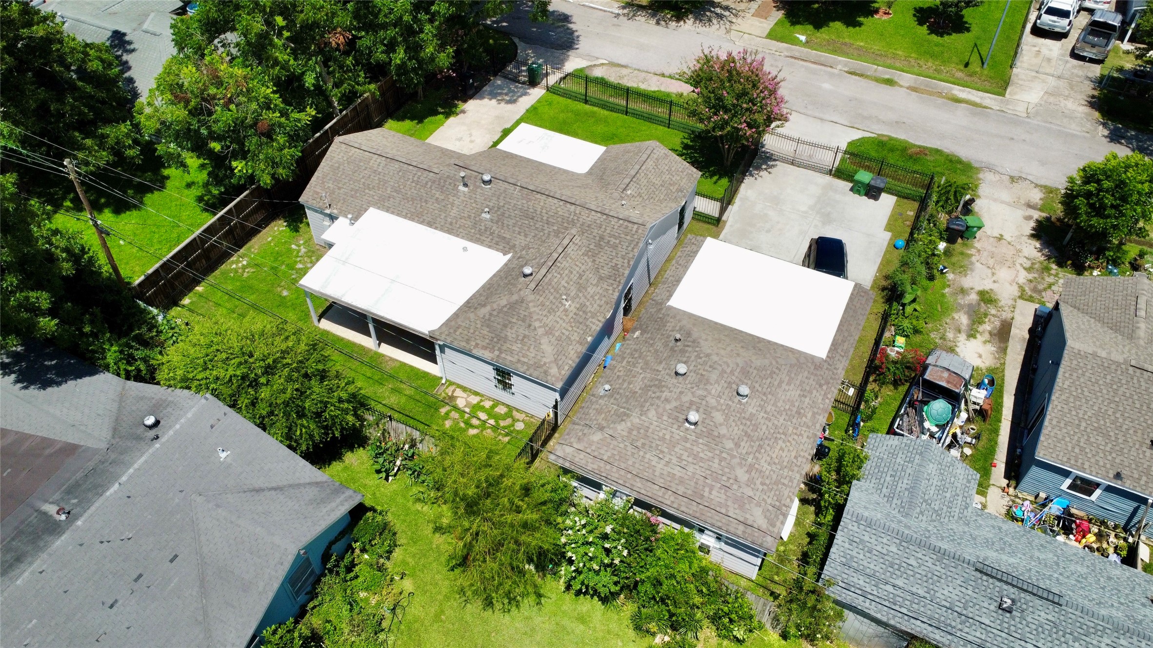 5701 Luna Street Houston, TX 77076 - Photo 8 of 50 an aerial view of a house with a yard