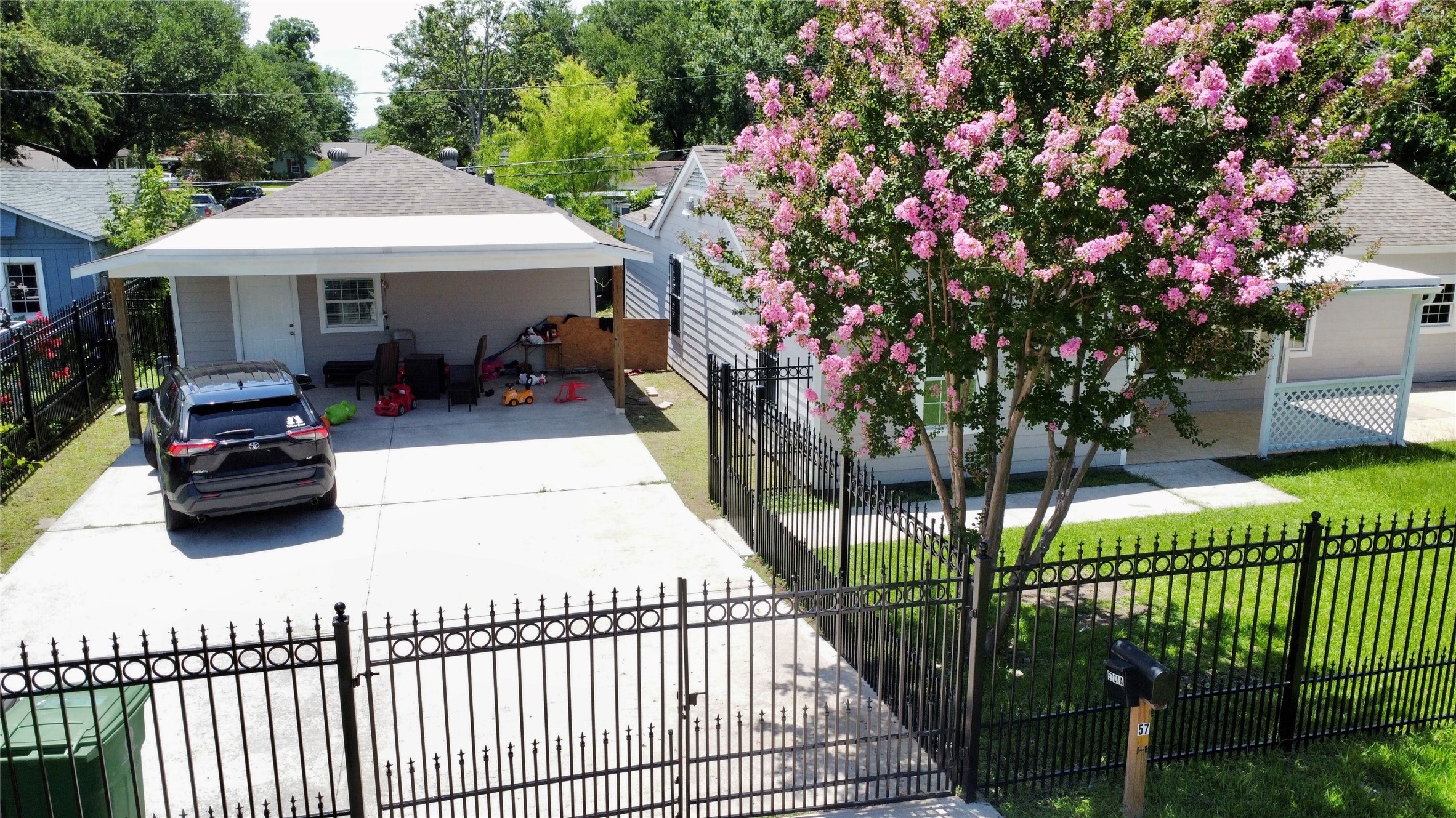 5701 Luna Street Houston, TX 77076 - Photo 10 of 50 a view of a house with backyard and sitting area