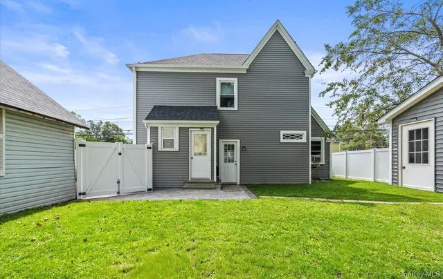 a view of backyard with a garden and yard