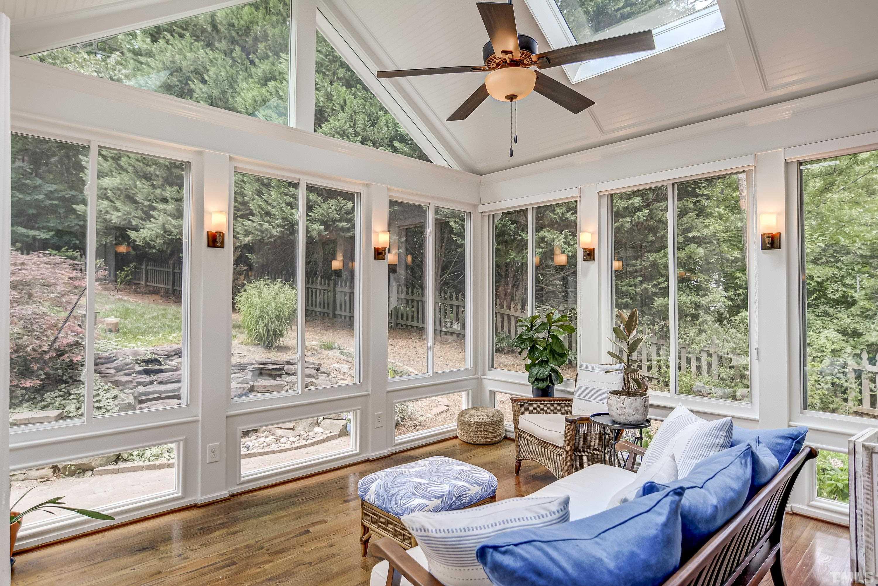 1309 Wescott Drive Raleigh, NC 27614 - Photo 16 of 32 a living room with furniture and windows