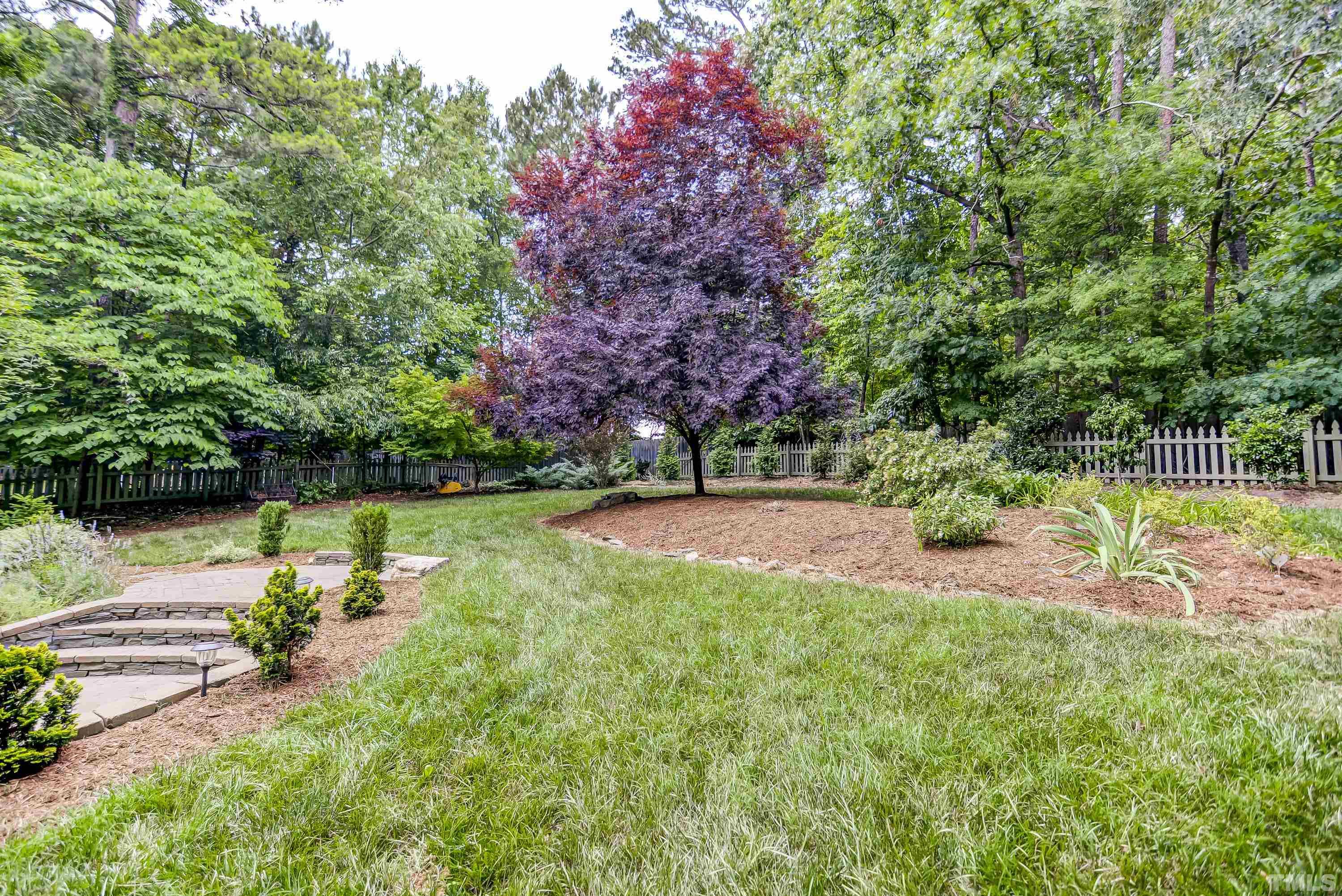 1309 Wescott Drive Raleigh, NC 27614 - Photo 31 of 32 a view of a park with large trees