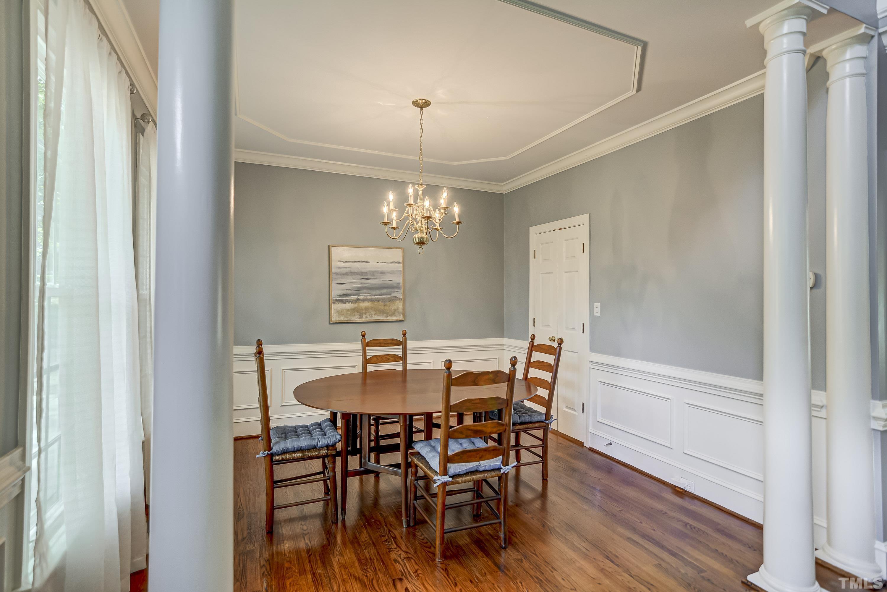 1309 Wescott Drive Raleigh, NC 27614 - Photo 8 of 32 a view of a dining room with furniture window and wooden floor