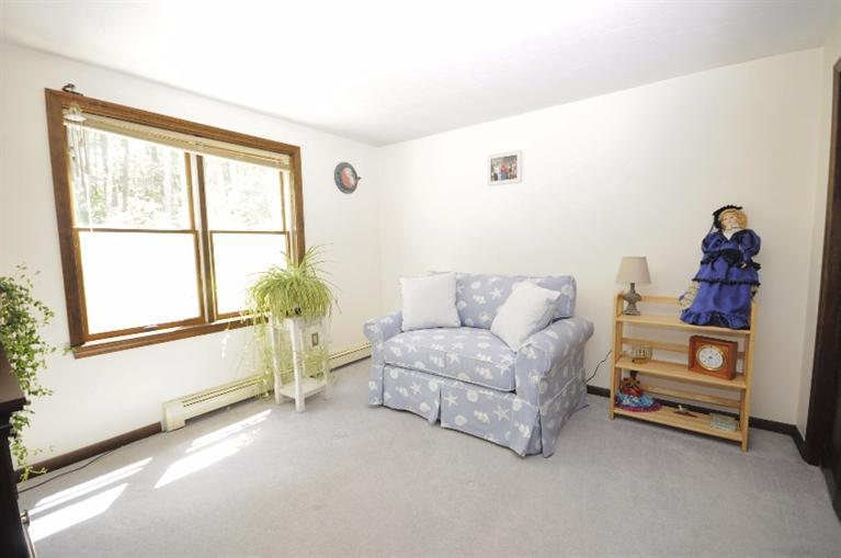 5 Easting Road Bourne, MA 02532 - Photo 11 of 26 a living room with furniture and a window