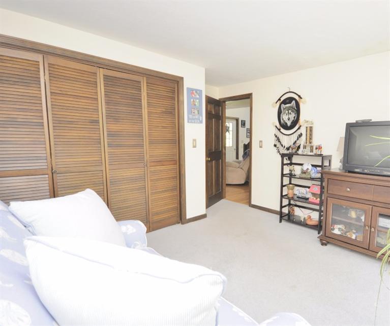 5 Easting Road Bourne, MA 02532 - Photo 12 of 26 a bedroom with a bed and furniture