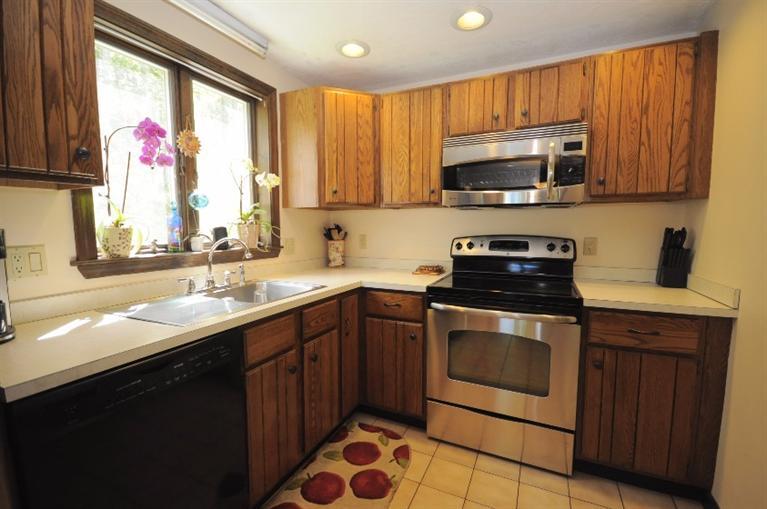 5 Easting Road Bourne, MA 02532 - Photo 5 of 26 a kitchen with a sink stove and microwave