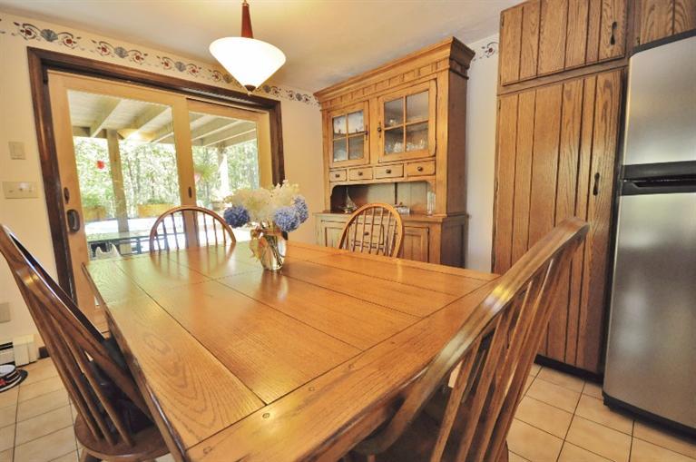 5 Easting Road Bourne, MA 02532 - Photo 7 of 26 view of a dining room with furniture large window and wooden floor
