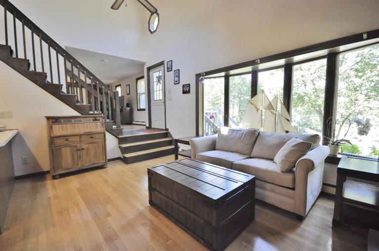 5 Easting Road Bourne, MA 02532 - Photo 9 of 26 a living room with furniture and a large window