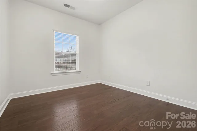 a workspace with furniture and window
