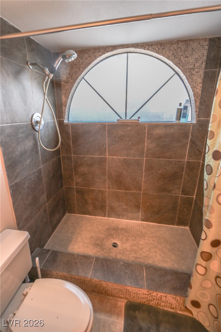 3201 La Mancha Way Henderson, NV 89014 - Photo 23 of 43 Full bathroom featuring a stall shower and tile patterned floors