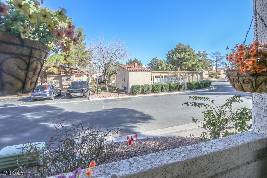 3201 La Mancha Way Henderson, NV 89014 - Photo 39 of 43 View of asphalt road featuring curbs and a residential view