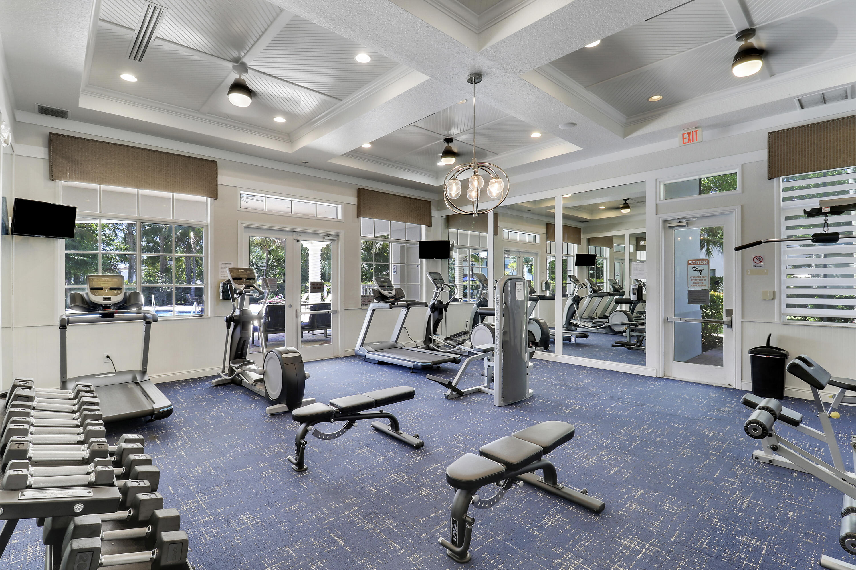 4170 Napoli Lake Drive Riviera Beach, FL 33410 - Photo 31 of 36 a view of a room with gym equipment