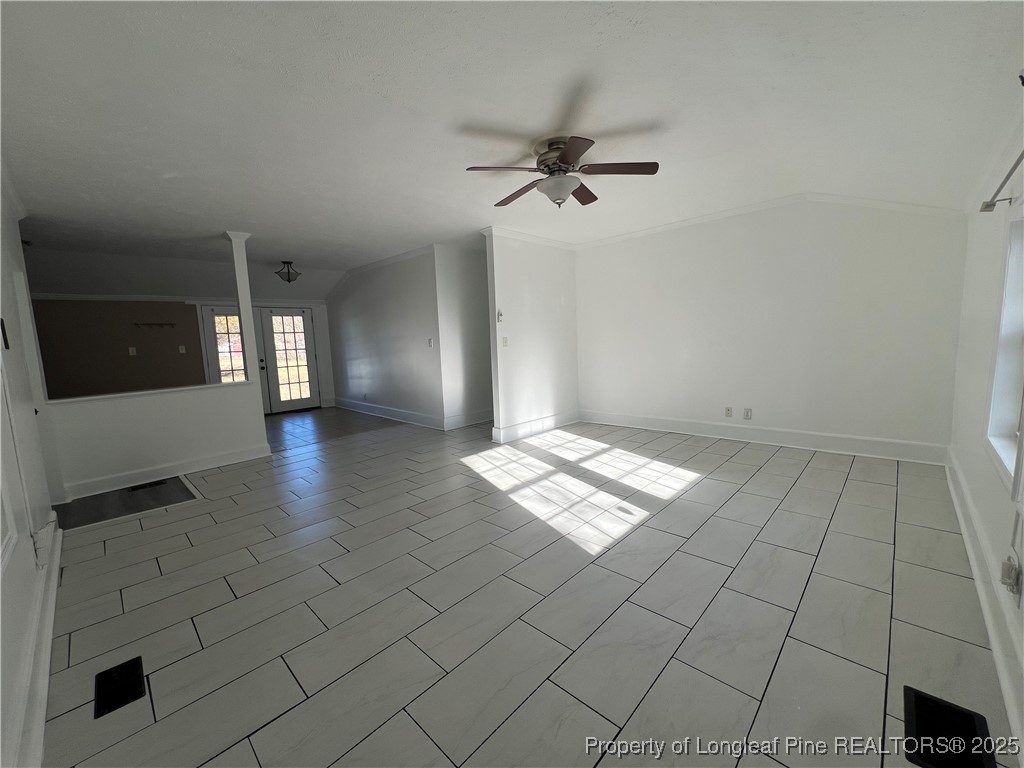 1443 Strickland Bridge Road Fayetteville, NC 28304 - Photo 3 of 10 a view of empty room with window