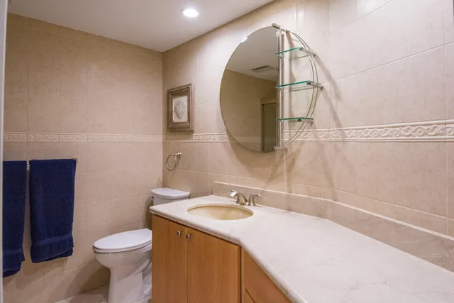 a bathroom with a tub and shower