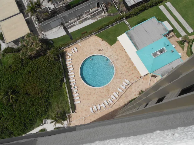 a view of a dinning area with table and chairs