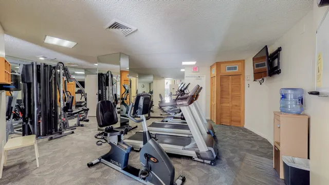 a view of a room with gym equipment