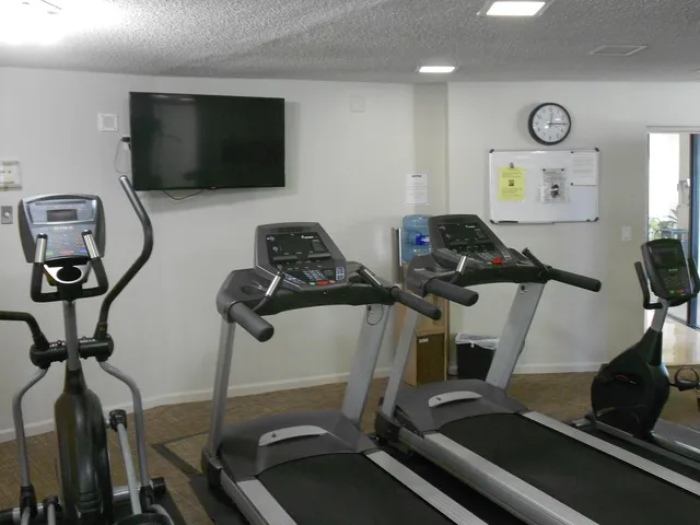 a front view of a building with outdoor space